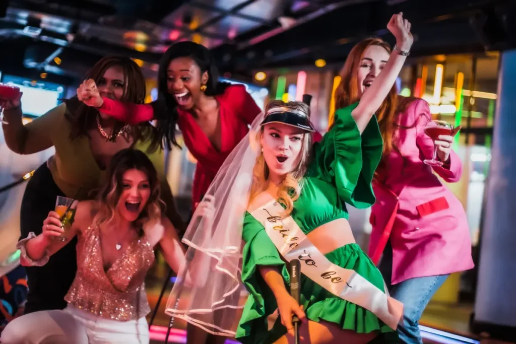 Women partying and golfing at Puttshack